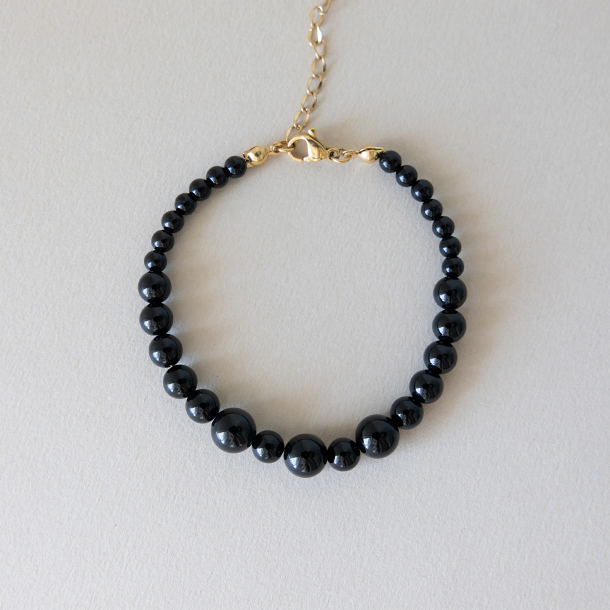 Amber perlearmb�nd